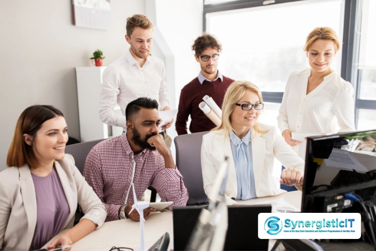 SynergisticIT team collaborating on software development and IT staffing solutions.
