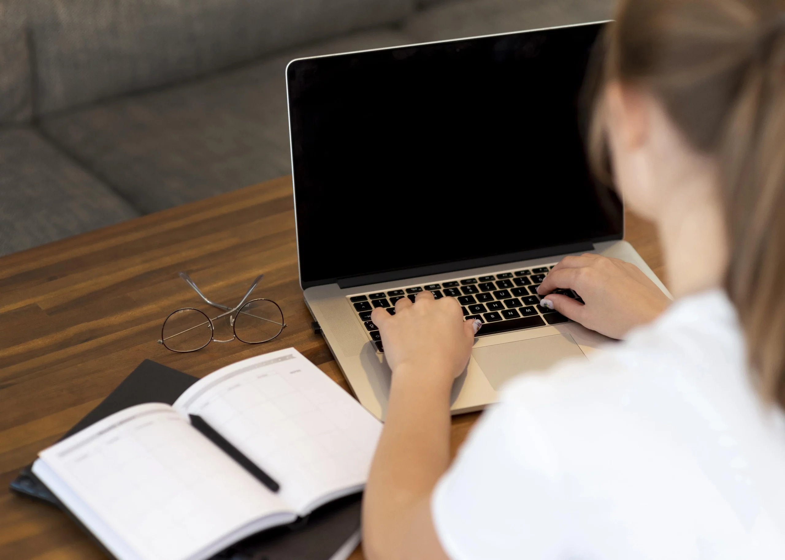 woman-working-from-home-social-distancing-with-notebook-laptop-min What Makes SynergisticIT Data Science Training The Best