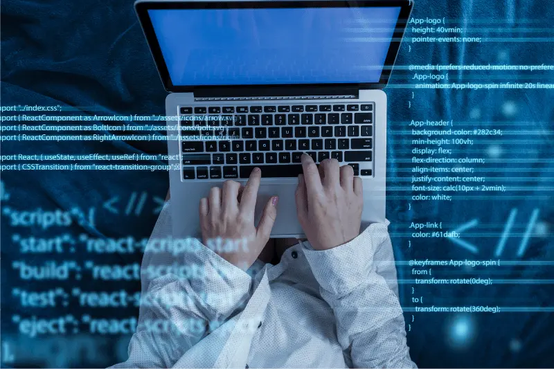 Hands typing Java code on laptop, illustrating professional Java training and career opportunities.