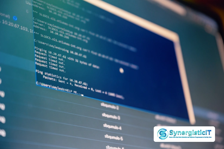 SQL code snippet on computer screen illustrating technical interview preparation and SynergisticIT’s job placement program.