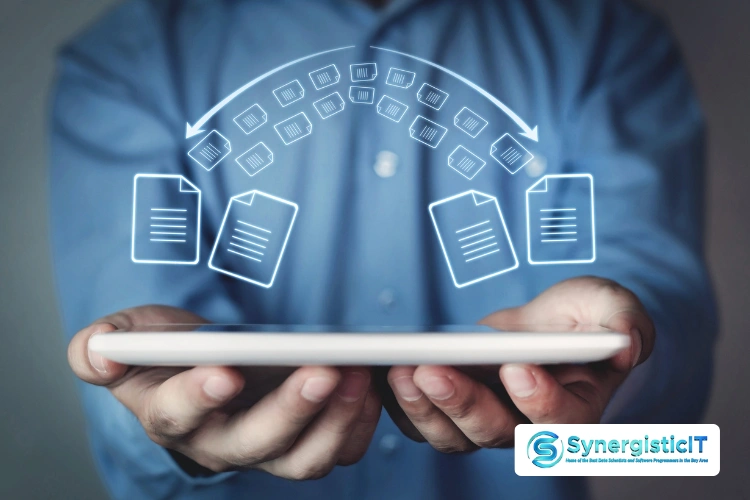 Man holding data files illustrating SAS interview questions and answers.