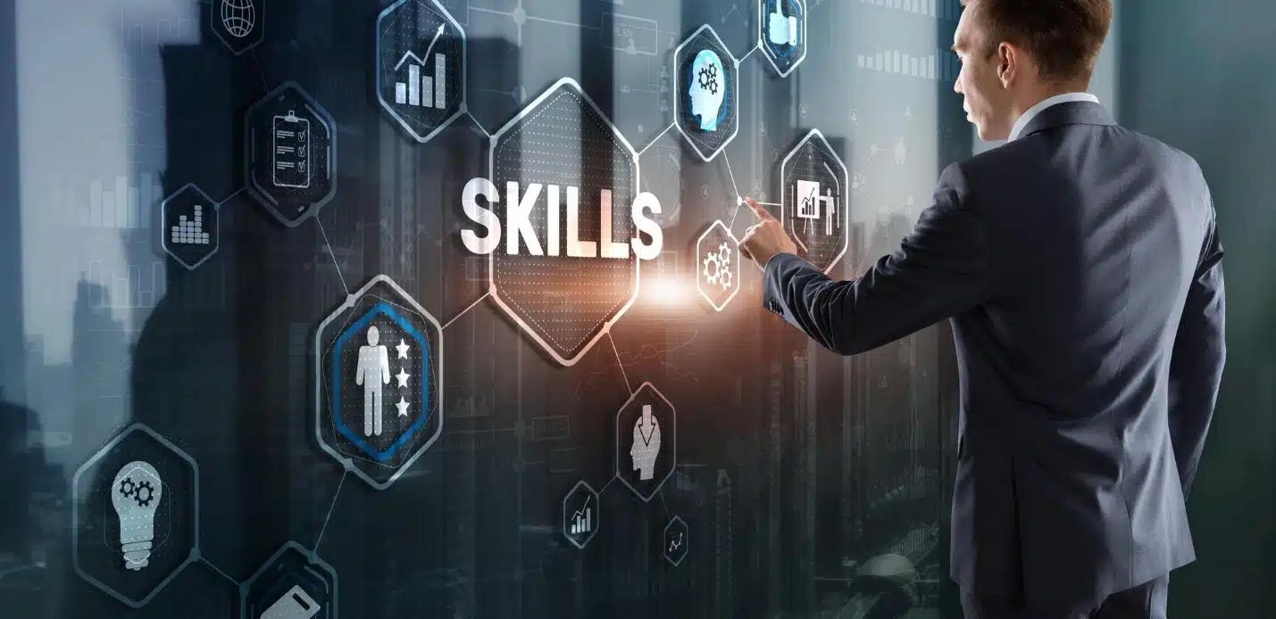 Man interacting with digital display highlighting skills and certifications for tech hiring.
