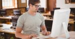 Man coding in Java, learning technical skills for tech job placement in Fremont, California.